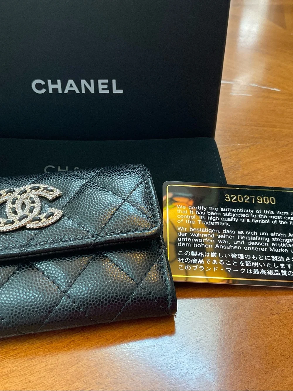 CHANEL Black Quilted Caviar Wallet. AUTHENTIC AND BRAND NEW.